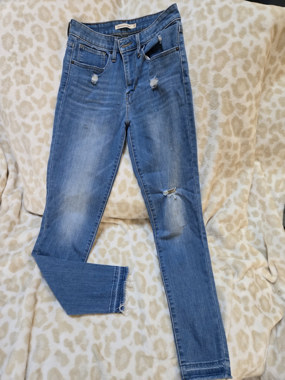 Levi's Light Blue Distressed Ankle Jeans